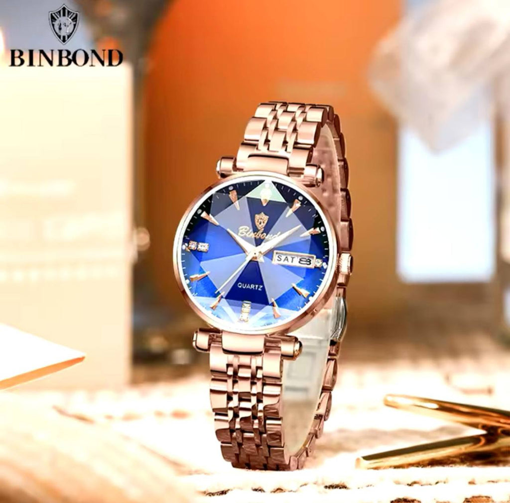 BINBOND LADIES WATER RESISTANT BATTERY POWERED NON FADE STEEL POLISH DAY AND DATE DISPLAY AND ENQUIRIES