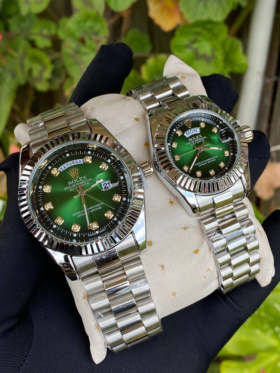 ROLEX COUPLE WATCHES SINGLE PIECE DAY AND DATE DISPLAY WATER RESISTANT BATTERY POWERED ENQUIRIES