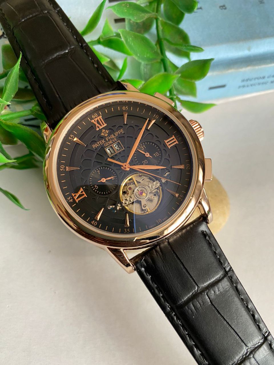 PATEK PHILLIPE AUTOMATIC CHRONOGRAPH WATER RESISTANT DATE DISPLAY