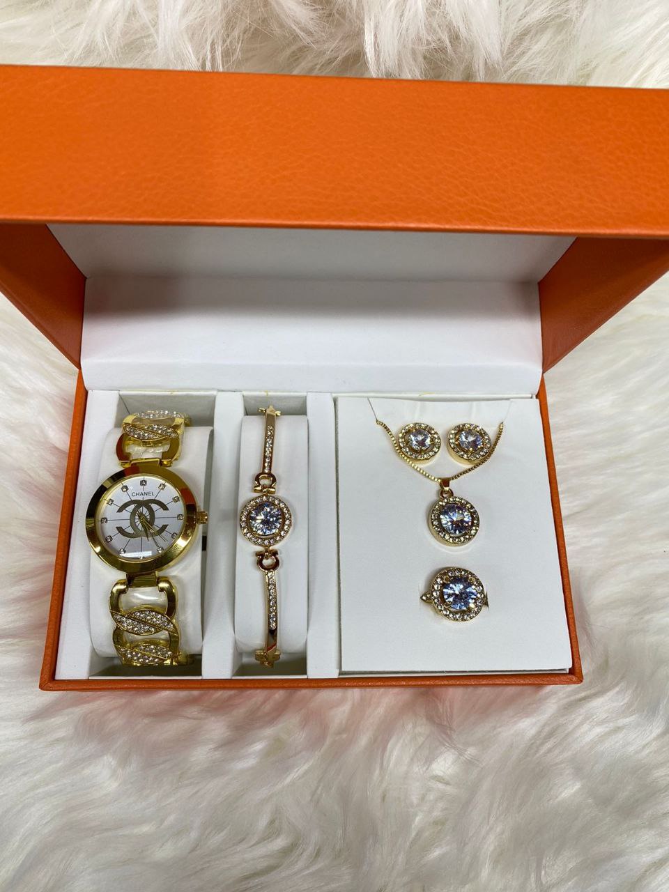 A SET OF WATCH BRACELET NECKLACE EARRINGS RING
