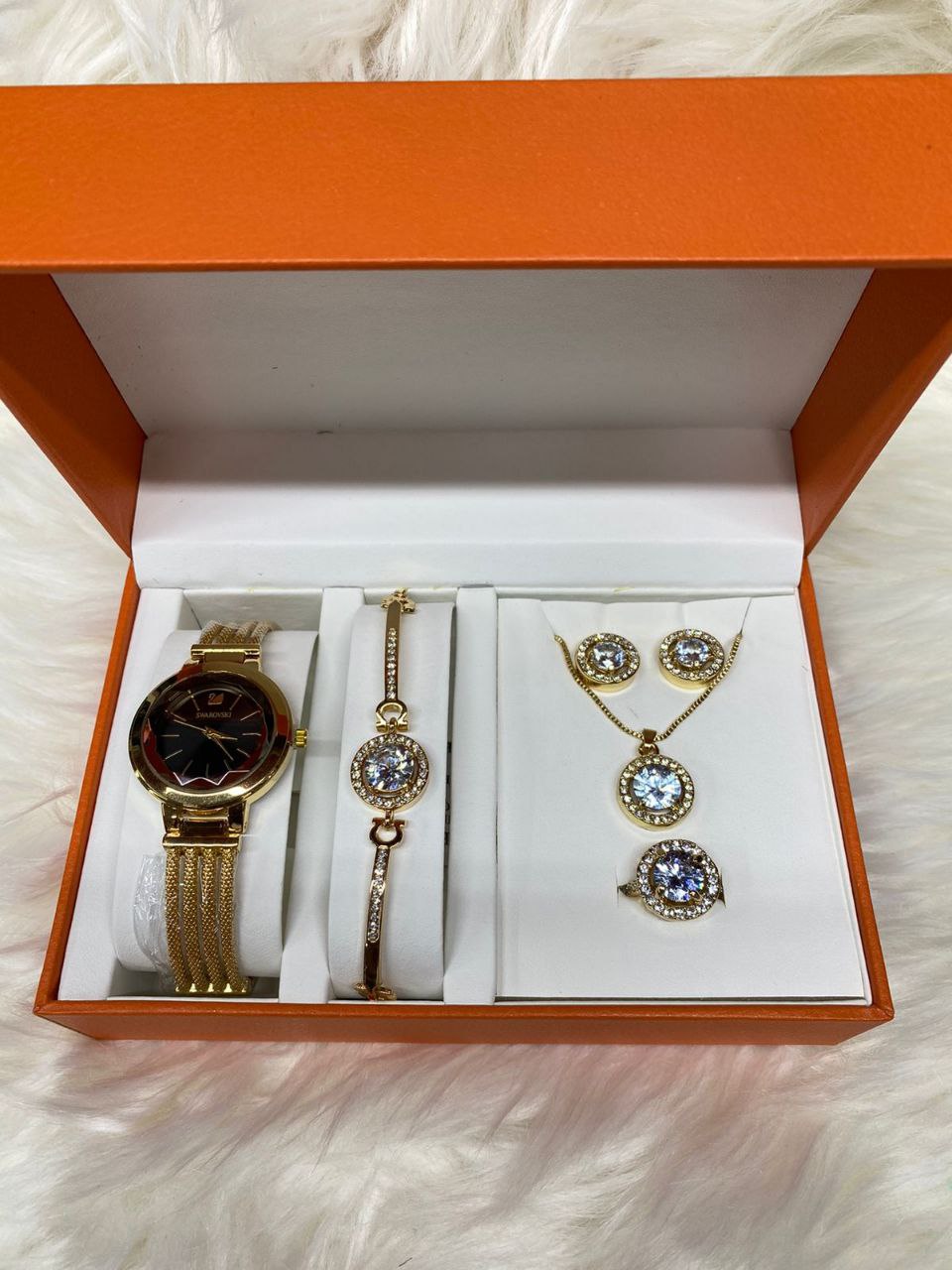 A SET OF WATCH BRACELET NECKLACE EARRINGS RING