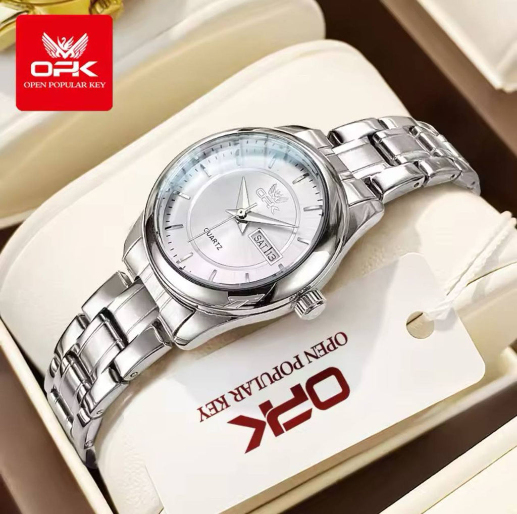 ‼ BRAND ALERT ‼ OPK LADIES WATCH #8167 DATE DISPLAY STAINLESS STEEL BATTERY POWERED WATER RESISTANT ENGRAVING SERVICES ENQUIRIES