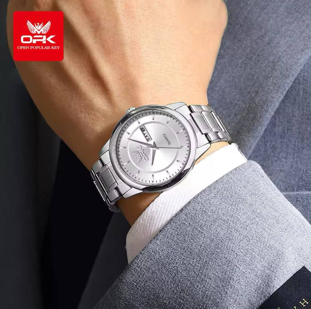 ‼ BRAND ALERT ‼ OPK LADIES WATCH #8167 DATE DISPLAY STAINLESS STEEL BATTERY POWERED WATER RESISTANT ENGRAVING SERVICES ENQUIRIES