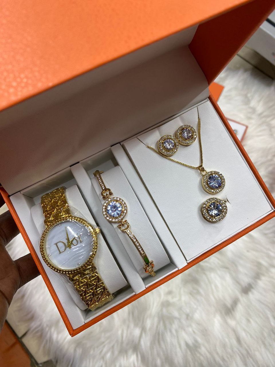A SET OF WATCH BRACELET RING NECKLACE EARRINGS
