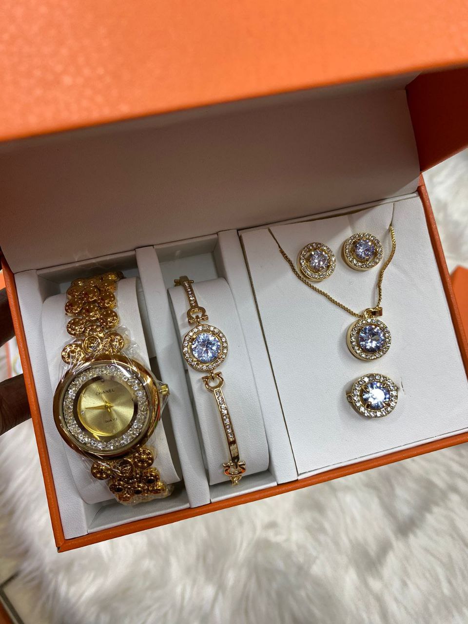 A SET OF WATCH BRACELET RING NECKLACE EARRINGS