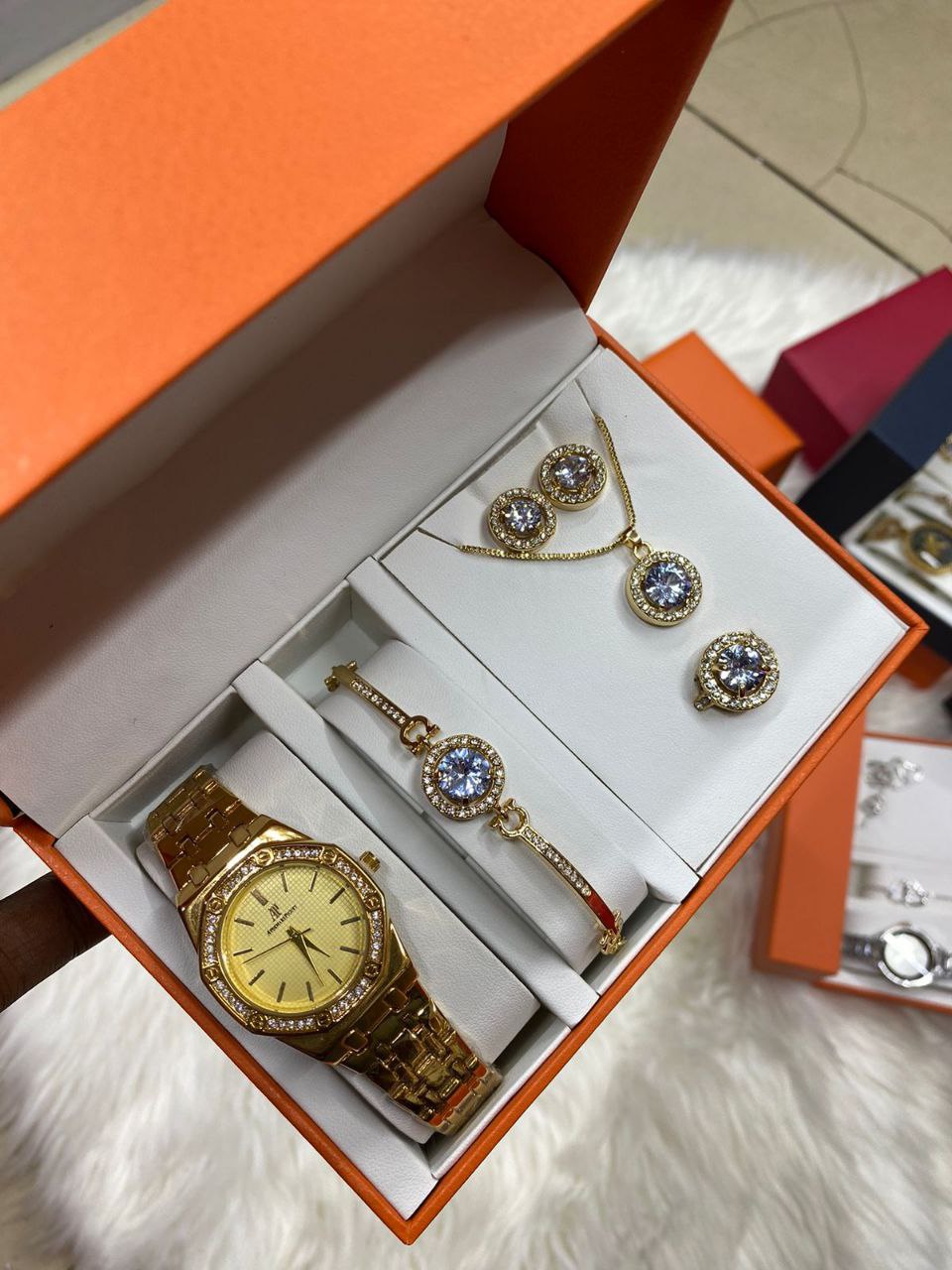 A SET OF WATCH BRACELET RING NECKLACE EARRINGS