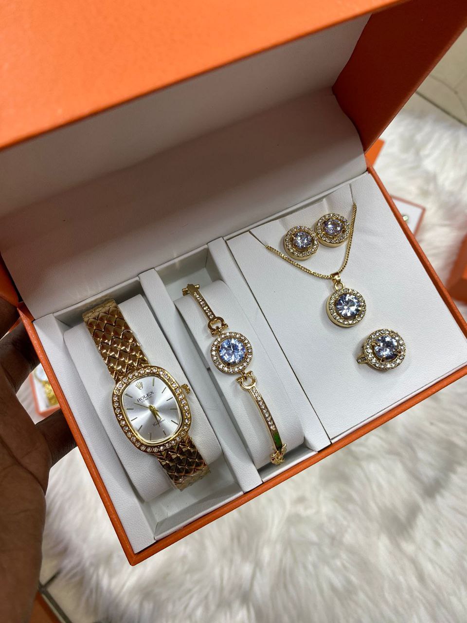 A SET OF WATCH BRACELET RING NECKLACE EARRINGS