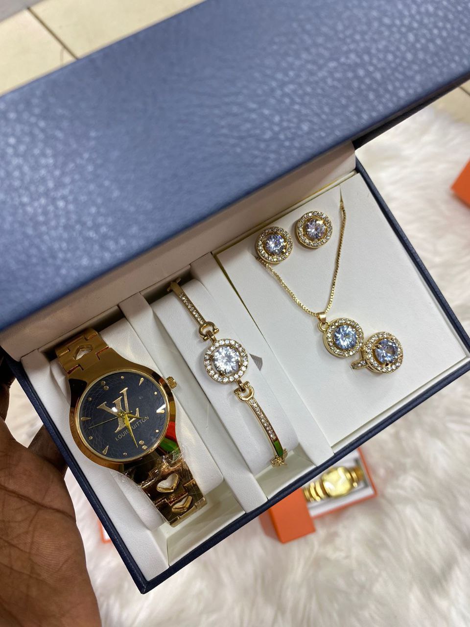 A SET OF WATCH BRACELET RING NECKLACE EARRINGS