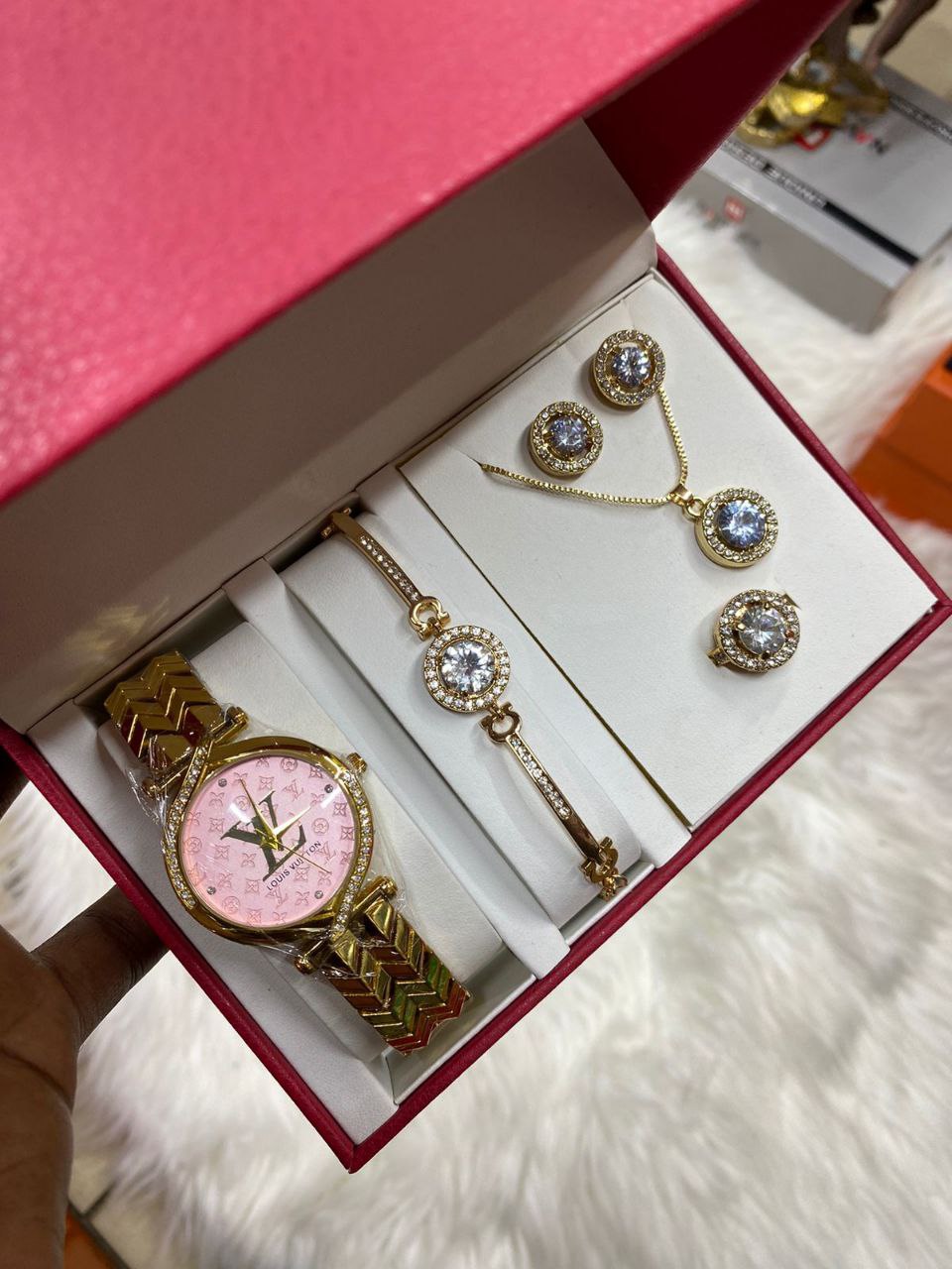 A SET OF WATCH BRACELET RING NECKLACE EARRINGS