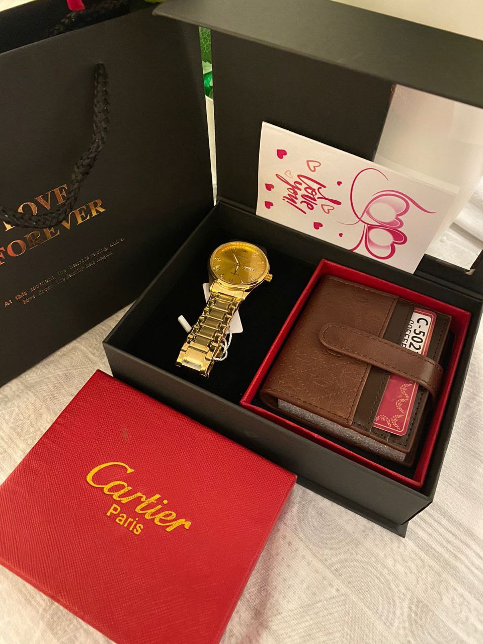 FATHERS DAY GIFT IDEAS WATCH 1800 CARD HOLDER 1000 BANGLE 300 BOX,BAG,CARD 500 TOTAL 3600