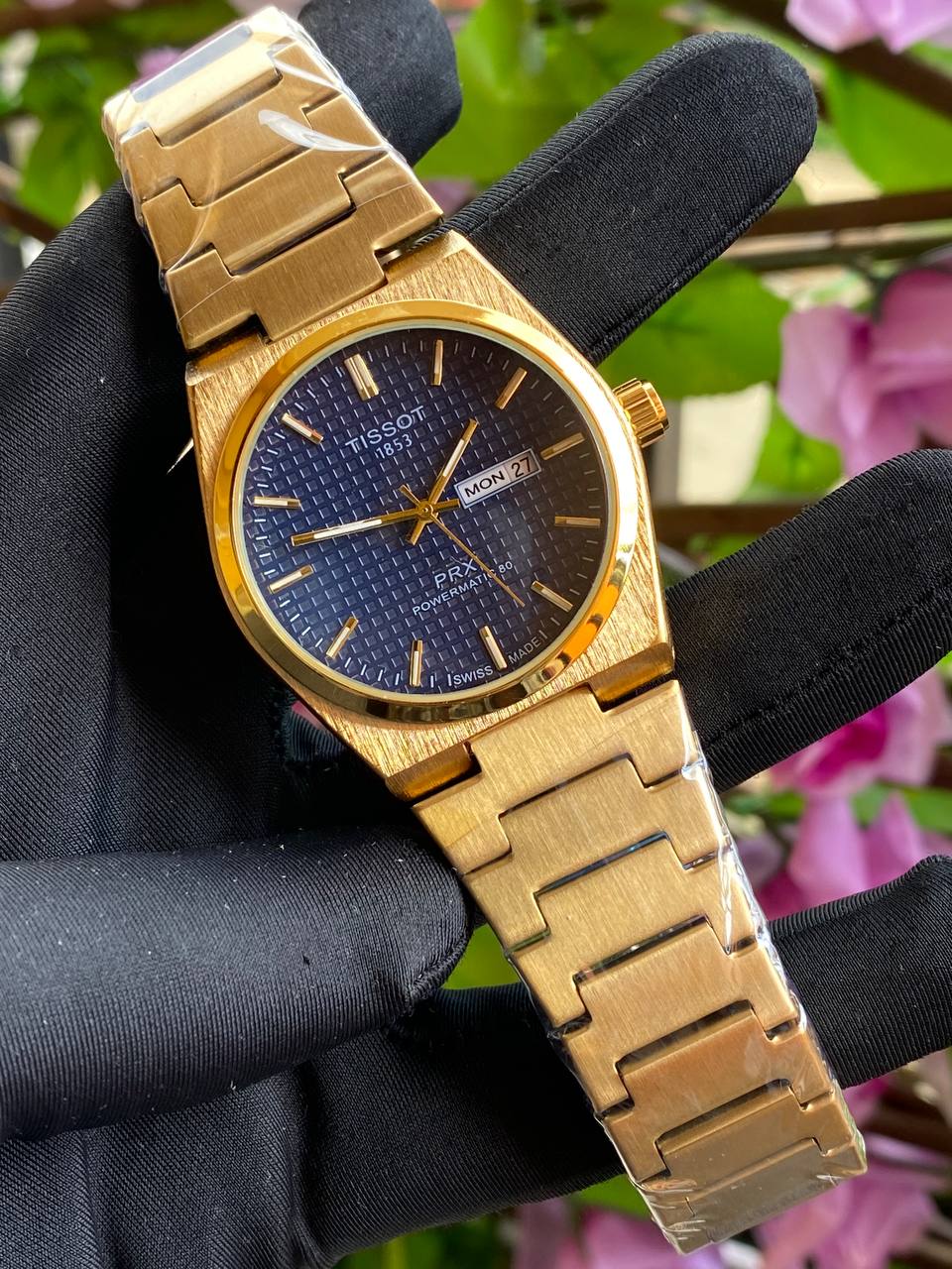 TISSOT DAY & DATE BATTERY POWERED WATER RESISTANT DAY & DATE DISPLAY STAINLESS STEEL FINISH ENQUIRIES