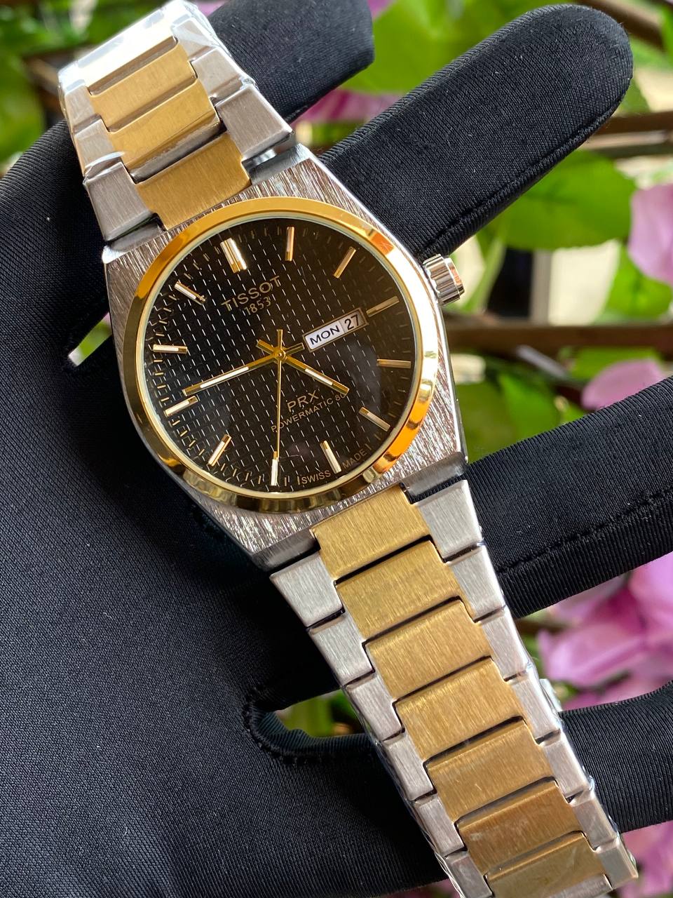 TISSOT DAY & DATE BATTERY POWERED WATER RESISTANT DAY & DATE DISPLAY STAINLESS STEEL FINISH ENQUIRIES