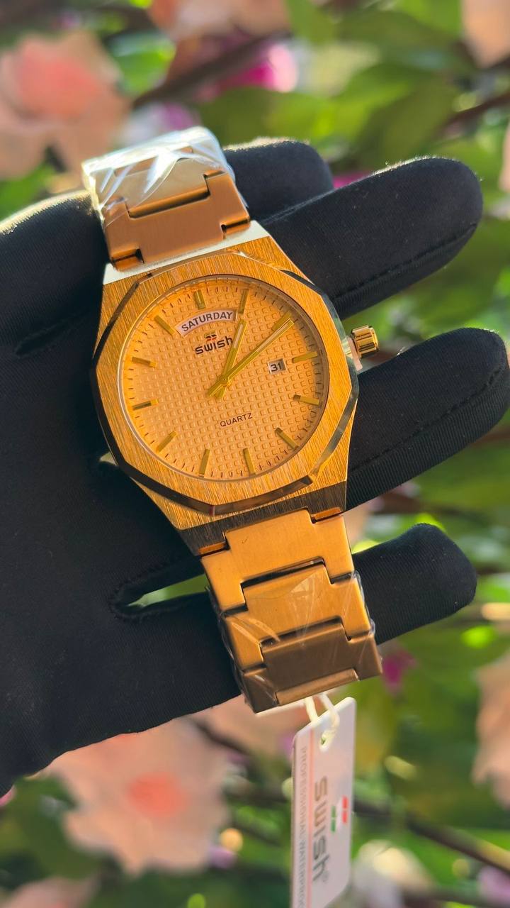 SWISH STYLISH GENTS WATCH DAY/DATE DISPLAY BATTERY POWERED STAINLESS STEEL WATER RESISTANT ENQUIRIES