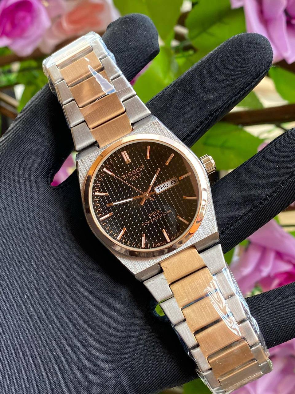 TISSOT DAY & DATE BATTERY POWERED WATER RESISTANT DAY & DATE DISPLAY STAINLESS STEEL FINISH ENQUIRIES