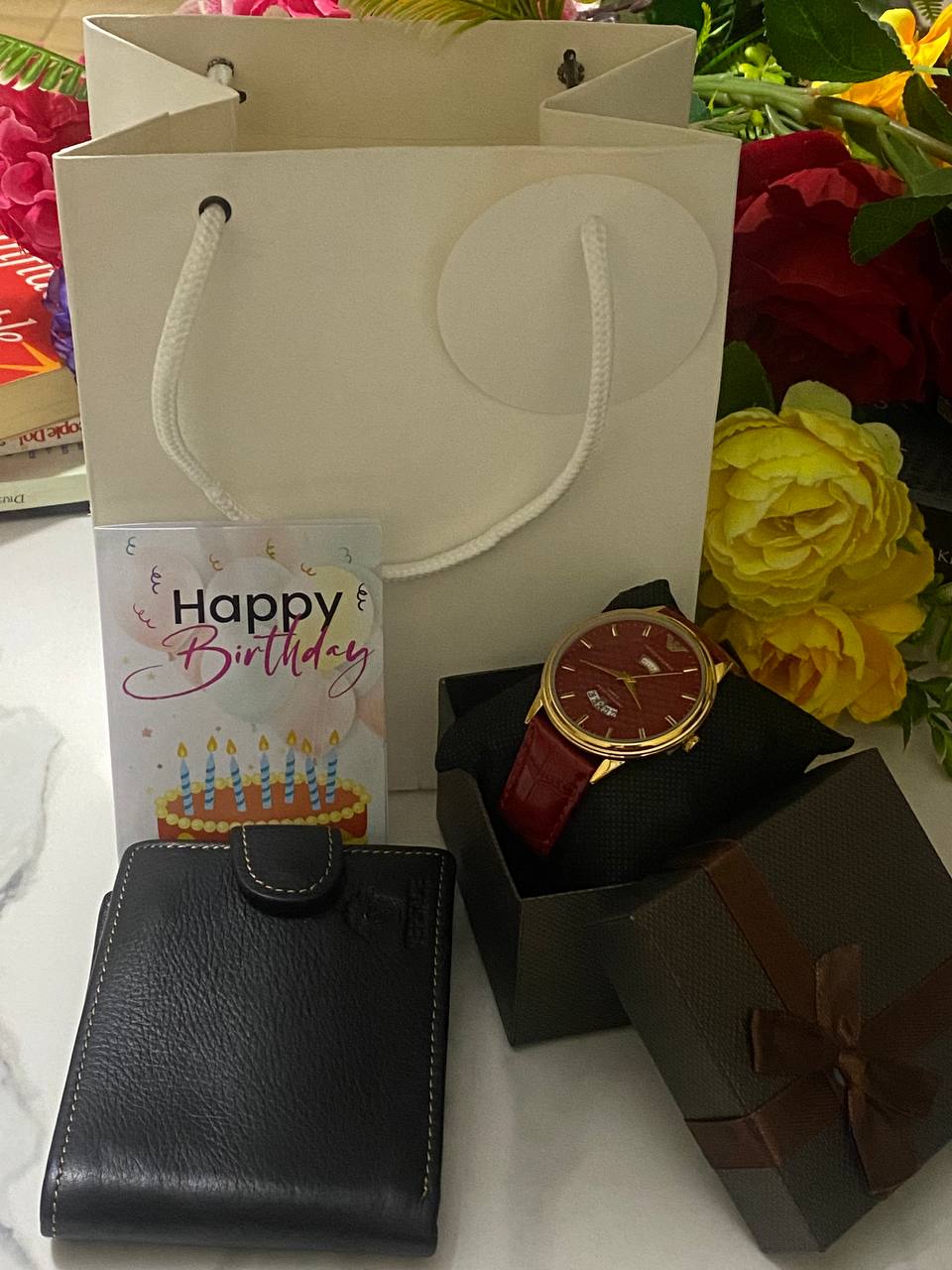 SWISH GENTS WATCH DAY&DATE DISPLAY BATTERY POWERED STAINLESS STEEL WATER RESISTANT TWO-TONE GOLDSILVER ENQUIRIES